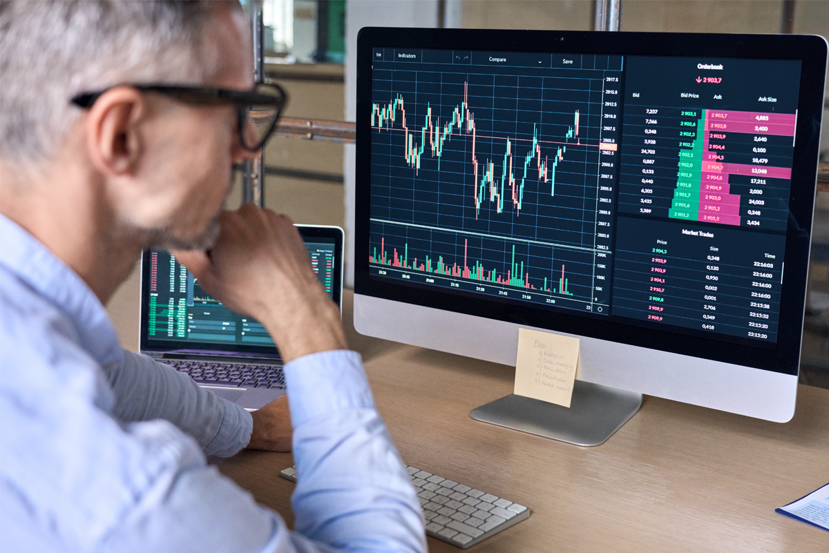 Investor purchasing individual stocks.